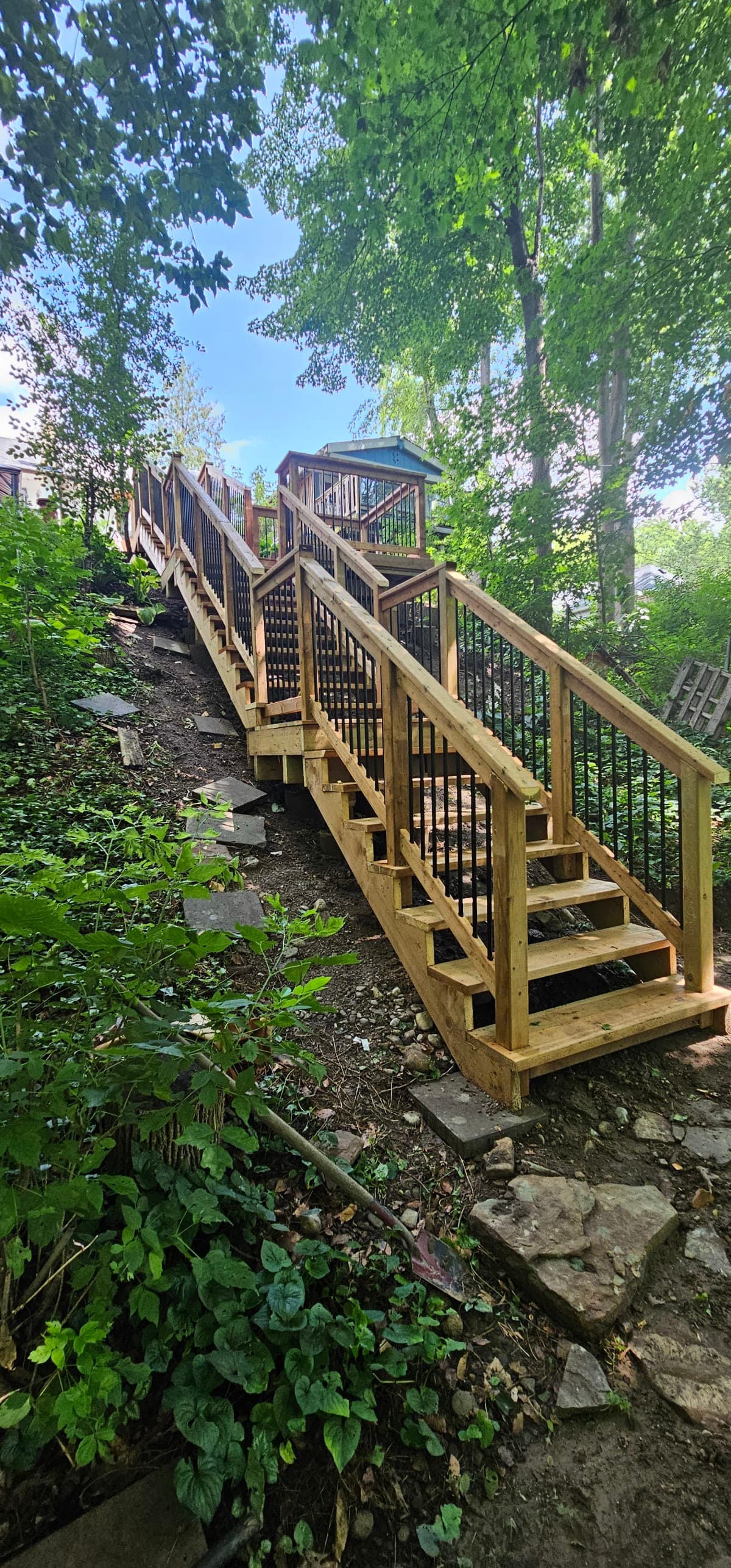 Wooden deck being built in a Canadian backyard