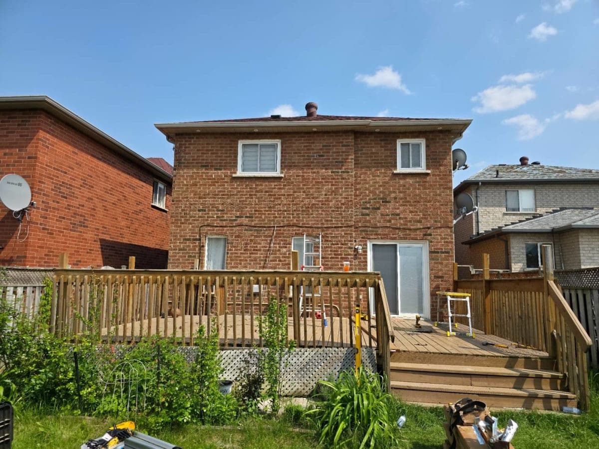 Close-up of roofing lumber and galvanized fasteners on a construction site