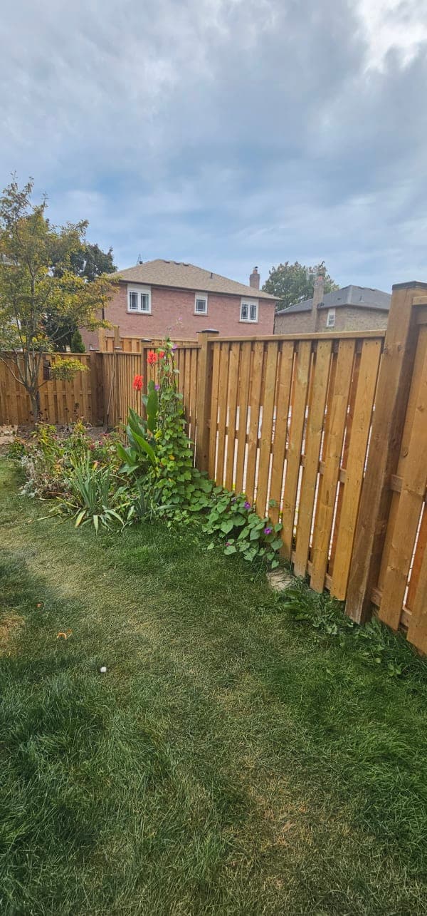 Wooden fence panels with different lumber types